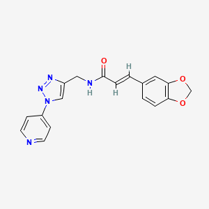 molecular formula C18H15N5O3 B2772074 (E)-3-(苯并[d][1,3]二噁唑-5-基)-N-((1-(吡啶-4-基)-1H-1,2,3-三唑-4-基)甲基)丙烯酰胺 CAS No. 2097941-02-9