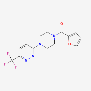 molecular formula C14H13F3N4O2 B2772654 3-[4-(Furan-2-carbonyl)piperazin-1-yl]-6-(trifluoromethyl)pyridazine CAS No. 2094681-73-7