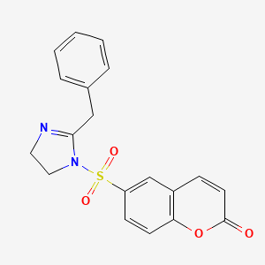 molecular formula C19H16N2O4S B2773276 6-{[2-Benzyl-2-imidazolinyl]sulfonyl}chromen-2-one CAS No. 873589-17-4
