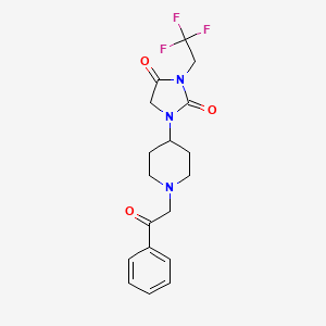 molecular formula C18H20F3N3O3 B2773285 1-[1-(2-Oxo-2-phenylethyl)piperidin-4-yl]-3-(2,2,2-trifluoroethyl)imidazolidine-2,4-dione CAS No. 2097863-16-4