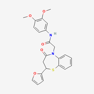 molecular formula C23H22N2O5S B2774265 N-(3,4-dimethoxyphenyl)-2-(2-(furan-2-yl)-4-oxo-3,4-dihydrobenzo[b][1,4]thiazepin-5(2H)-yl)acetamide CAS No. 863005-02-1