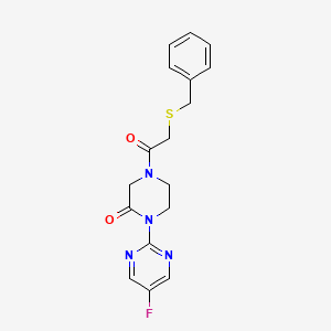 molecular formula C17H17FN4O2S B2774278 4-(2-Benzylsulfanylacetyl)-1-(5-fluoropyrimidin-2-yl)piperazin-2-one CAS No. 2320926-41-6