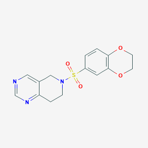 molecular formula C15H15N3O4S B2774428 6-((2,3-Dihydrobenzo[b][1,4]dioxin-6-yl)sulfonyl)-5,6,7,8-tetrahydropyrido[4,3-d]pyrimidine CAS No. 1795358-88-1