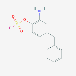 molecular formula C13H12FNO3S B2775062 2-Amino-4-benzyl-1-fluorosulfonyloxybenzene CAS No. 2411227-31-9