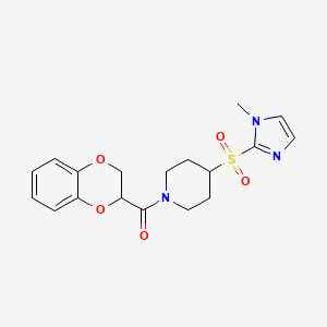 (2,3-dihydrobenzo[b][1,4]dioxin-2-yl)(4-((1-methyl-1H-imidazol-2-yl)sulfonyl)piperidin-1-yl)methanone