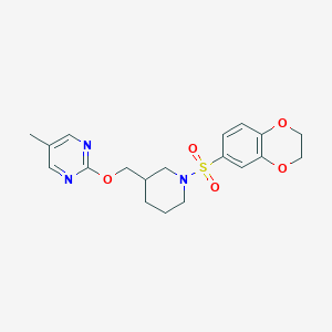 molecular formula C19H23N3O5S B2775345 2-{[1-(2,3-Dihydro-1,4-benzodioxine-6-sulfonyl)piperidin-3-yl]methoxy}-5-methylpyrimidine CAS No. 2379950-42-0