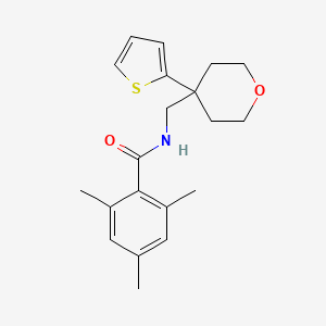 2,4,6-trimethyl-N-((4-(thiophen-2-yl)tetrahydro-2H-pyran-4-yl)methyl)benzamide