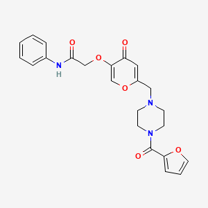 B2777216 2-((6-((4-(furan-2-carbonyl)piperazin-1-yl)methyl)-4-oxo-4H-pyran-3-yl)oxy)-N-phenylacetamide CAS No. 898455-75-9
