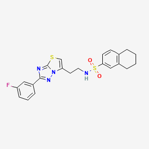 molecular formula C22H21FN4O2S2 B2777219 N-(2-(2-(3-fluorophenyl)thiazolo[3,2-b][1,2,4]triazol-6-yl)ethyl)-5,6,7,8-tetrahydronaphthalene-2-sulfonamide CAS No. 946274-65-3