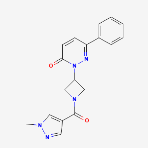 molecular formula C18H17N5O2 B2777608 2-[1-(1-Methylpyrazole-4-carbonyl)azetidin-3-yl]-6-phenylpyridazin-3-one CAS No. 2380141-77-3