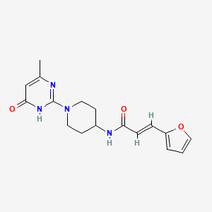 (E)-3-(furan-2-yl)-N-(1-(4-methyl-6-oxo-1,6-dihydropyrimidin-2-yl)piperidin-4-yl)acrylamide