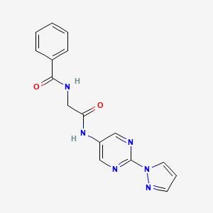 molecular formula C16H14N6O2 B2778574 N-(2-((2-(1H-pyrazol-1-yl)pyrimidin-5-yl)amino)-2-oxoethyl)benzamide CAS No. 1421509-72-9