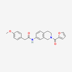 molecular formula C23H22N2O4 B2778760 N-(2-(呋喃-2-甲酰)-1,2,3,4-四氢异喹啉-7-基)-2-(4-甲氧基苯基)乙酰胺 CAS No. 955740-57-5