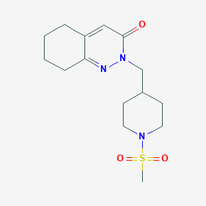 molecular formula C15H23N3O3S B2779183 2-[(1-Methanesulfonylpiperidin-4-yl)methyl]-2,3,5,6,7,8-hexahydrocinnolin-3-one CAS No. 2097927-38-1