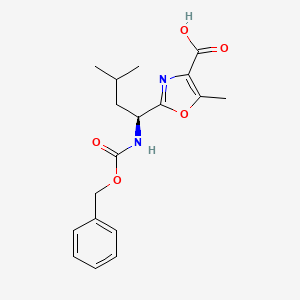 molecular formula C18H22N2O5 B2780816 2-[(1S)-1-{[(benzyloxy)carbonyl]amino}-3-methylbutyl]-5-methyl-1,3-oxazole-4-carboxylic acid CAS No. 1418113-59-3