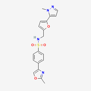 molecular formula C19H18N4O4S B2782827 4-(2-Methyl-1,3-oxazol-4-yl)-N-[[5-(2-methylpyrazol-3-yl)furan-2-yl]methyl]benzenesulfonamide CAS No. 2415470-33-4