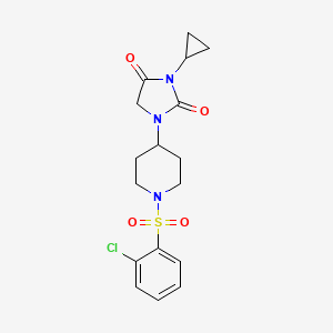 molecular formula C17H20ClN3O4S B2783051 1-[1-(2-Chlorobenzenesulfonyl)piperidin-4-yl]-3-cyclopropylimidazolidine-2,4-dione CAS No. 2097916-11-3
