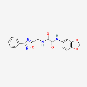molecular formula C18H14N4O5 B2783753 N1-(benzo[d][1,3]dioxol-5-yl)-N2-((3-phenyl-1,2,4-oxadiazol-5-yl)methyl)oxalamide CAS No. 1207032-76-5