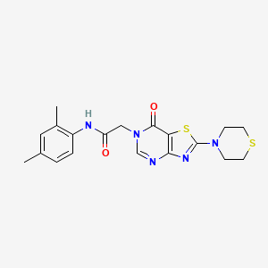 N-(2,4-dimethylphenyl)-2-[7-oxo-2-(thiomorpholin-4-yl)-6H,7H-[1,3]thiazolo[4,5-d]pyrimidin-6-yl]acetamide