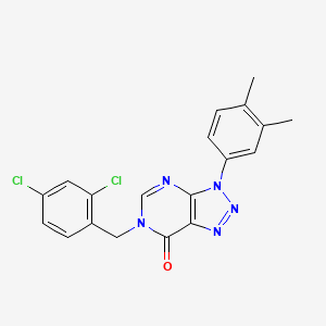 molecular formula C19H15Cl2N5O B2784355 6-[(2,4-二氯苯基)甲基]-3-(3,4-二甲基苯基)三唑并[4,5-d]嘧啶-7-酮 CAS No. 893920-83-7