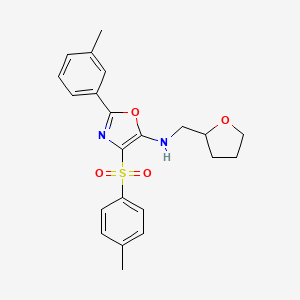 molecular formula C22H24N2O4S B2784860 N-((tetrahydrofuran-2-yl)methyl)-2-(m-tolyl)-4-tosyloxazol-5-amine CAS No. 862738-82-7