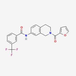 molecular formula C22H17F3N2O3 B2784888 N-(2-(furan-2-carbonyl)-1,2,3,4-tetrahydroisoquinolin-7-yl)-3-(trifluoromethyl)benzamide CAS No. 955665-64-2