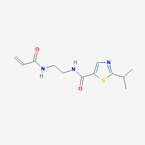 molecular formula C12H17N3O2S B2786297 2-Propan-2-yl-N-[2-(prop-2-enoylamino)ethyl]-1,3-thiazole-5-carboxamide CAS No. 2199780-07-7