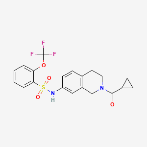 molecular formula C20H19F3N2O4S B2787527 N-(2-(cyclopropanecarbonyl)-1,2,3,4-tetrahydroisoquinolin-7-yl)-2-(trifluoromethoxy)benzenesulfonamide CAS No. 1448132-15-7