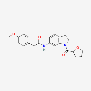 B2787769 2-(4-methoxyphenyl)-N-(1-(tetrahydrofuran-2-carbonyl)indolin-6-yl)acetamide CAS No. 1060182-48-0