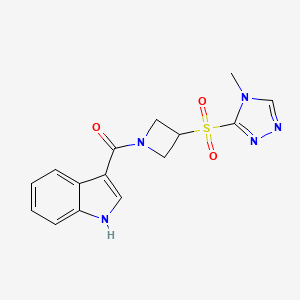 molecular formula C15H15N5O3S B2788638 (1H-indol-3-yl)(3-((4-methyl-4H-1,2,4-triazol-3-yl)sulfonyl)azetidin-1-yl)methanone CAS No. 2034428-33-4