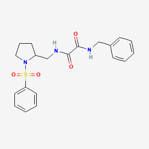 molecular formula C20H23N3O4S B2789767 N1-benzyl-N2-((1-(phenylsulfonyl)pyrrolidin-2-yl)methyl)oxalamide CAS No. 896264-40-7