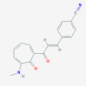 4-{3-[6-(Methylamino)-7-oxo-1,3,5-cycloheptatrien-1-yl]-3-oxo-1-propenyl}benzonitrile