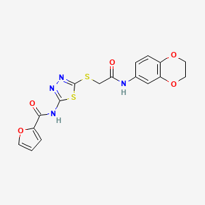 N-(5-((2-((2,3-dihydrobenzo[b][1,4]dioxin-6-yl)amino)-2-oxoethyl)thio)-1,3,4-thiadiazol-2-yl)furan-2-carboxamide