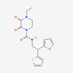 4-ethyl-N-[2-(furan-2-yl)-2-(thiophen-2-yl)ethyl]-2,3-dioxopiperazine-1-carboxamide
