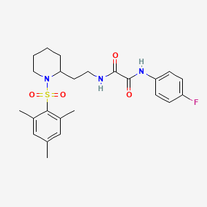 molecular formula C24H30FN3O4S B2790473 N1-(4-fluorophenyl)-N2-(2-(1-(mesitylsulfonyl)piperidin-2-yl)ethyl)oxalamide CAS No. 898446-18-9