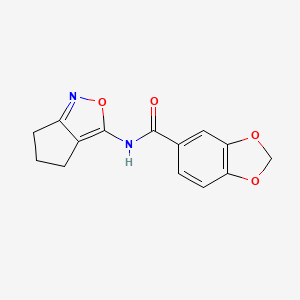molecular formula C14H12N2O4 B2792709 N-(5,6-dihydro-4H-cyclopenta[c]isoxazol-3-yl)benzo[d][1,3]dioxole-5-carboxamide CAS No. 946370-36-1