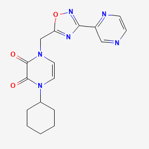 B2793108 1-Cyclohexyl-4-[(3-pyrazin-2-yl-1,2,4-oxadiazol-5-yl)methyl]pyrazine-2,3-dione CAS No. 2379996-80-0