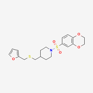 molecular formula C19H23NO5S2 B2793236 1-((2,3-Dihydrobenzo[b][1,4]dioxin-6-yl)sulfonyl)-4-(((furan-2-ylmethyl)thio)methyl)piperidine CAS No. 1396767-74-0