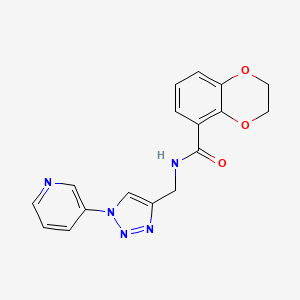 molecular formula C17H15N5O3 B2793432 N-((1-(pyridin-3-yl)-1H-1,2,3-triazol-4-yl)methyl)-2,3-dihydrobenzo[b][1,4]dioxine-5-carboxamide CAS No. 2034385-45-8