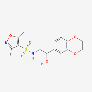 molecular formula C15H18N2O6S B2793816 N-(2-(2,3-dihydrobenzo[b][1,4]dioxin-6-yl)-2-hydroxyethyl)-3,5-dimethylisoxazole-4-sulfonamide CAS No. 1790766-78-7