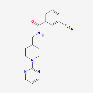molecular formula C18H19N5O B2794560 3-氰基-N-((1-(嘧啶-2-基)哌啶-4-基)甲基)苯甲酰胺 CAS No. 1235394-94-1