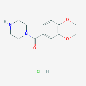 molecular formula C13H17ClN2O3 B2794958 (2,3-Dihydrobenzo[b][1,4]dioxin-6-yl)(piperazin-1-yl)methanone hydrochloride CAS No. 1353958-38-9