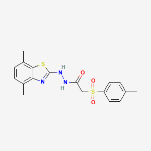 molecular formula C18H19N3O3S2 B2796222 N'-(4,7-dimethylbenzo[d]thiazol-2-yl)-2-tosylacetohydrazide CAS No. 922990-91-8