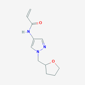 molecular formula C11H15N3O2 B2796670 N-[1-(氧杂环戊烷-2-基甲基)吡唑-4-基]丙-2-烯酰胺 CAS No. 1154122-14-1