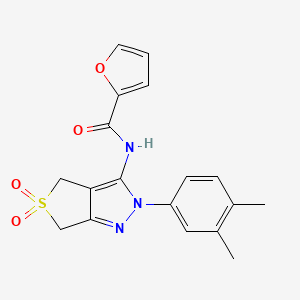 molecular formula C18H17N3O4S B2797381 N-(2-(3,4-dimethylphenyl)-5,5-dioxido-4,6-dihydro-2H-thieno[3,4-c]pyrazol-3-yl)furan-2-carboxamide CAS No. 681267-28-7