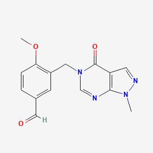 4-methoxy-3-[(1-methyl-4-oxo-1,4-dihydro-5H-pyrazolo[3,4-d]pyrimidin-5-yl)methyl]benzaldehyde