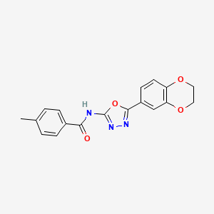 molecular formula C18H15N3O4 B2798185 N-[5-(2,3-dihydro-1,4-benzodioxin-6-yl)-1,3,4-oxadiazol-2-yl]-4-methylbenzamide CAS No. 862808-15-9