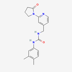 molecular formula C19H22N4O2 B2798566 1-(3,4-Dimethylphenyl)-3-[[2-(2-oxopyrrolidin-1-yl)pyridin-4-yl]methyl]urea CAS No. 2309589-72-6