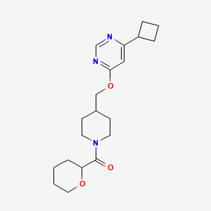 molecular formula C20H29N3O3 B2799332 4-Cyclobutyl-6-{[1-(oxane-2-carbonyl)piperidin-4-yl]methoxy}pyrimidine CAS No. 2380040-43-5