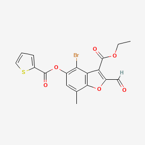molecular formula C18H13BrO6S B2799693 Ethyl 4-bromo-2-formyl-7-methyl-5-(thiophene-2-carbonyloxy)-1-benzofuran-3-carboxylate CAS No. 330676-32-9
